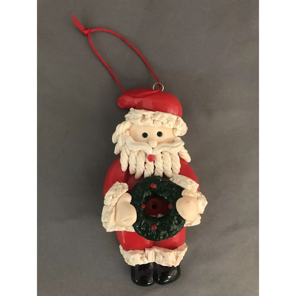 Vintage 1999 Santa Claus Christmas Ornament Holding Wreath Ceramic